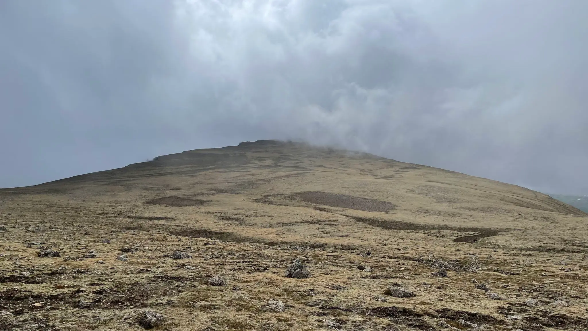 Ridge opens up to alpine pasture