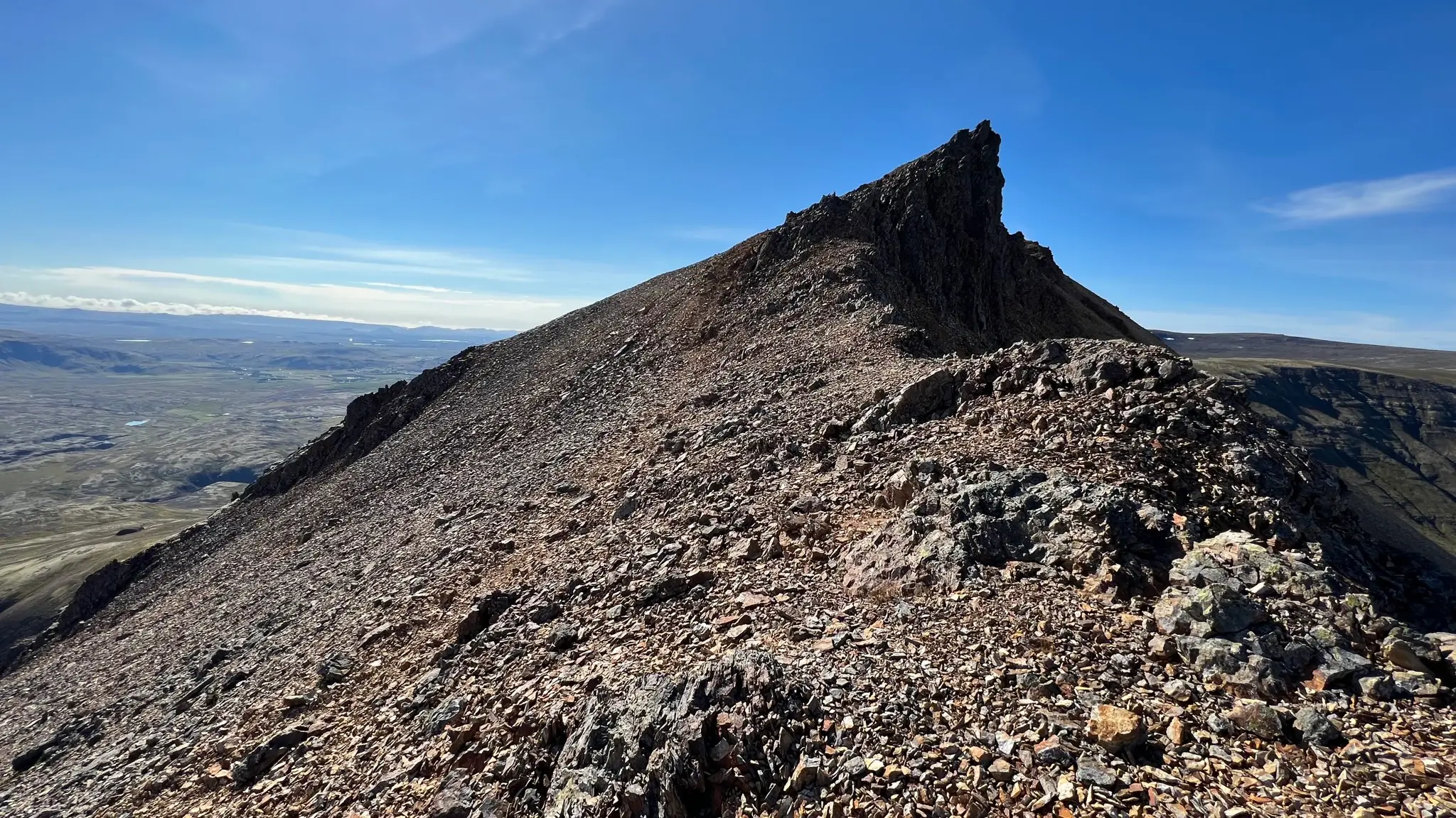 Flat area near the middle summit