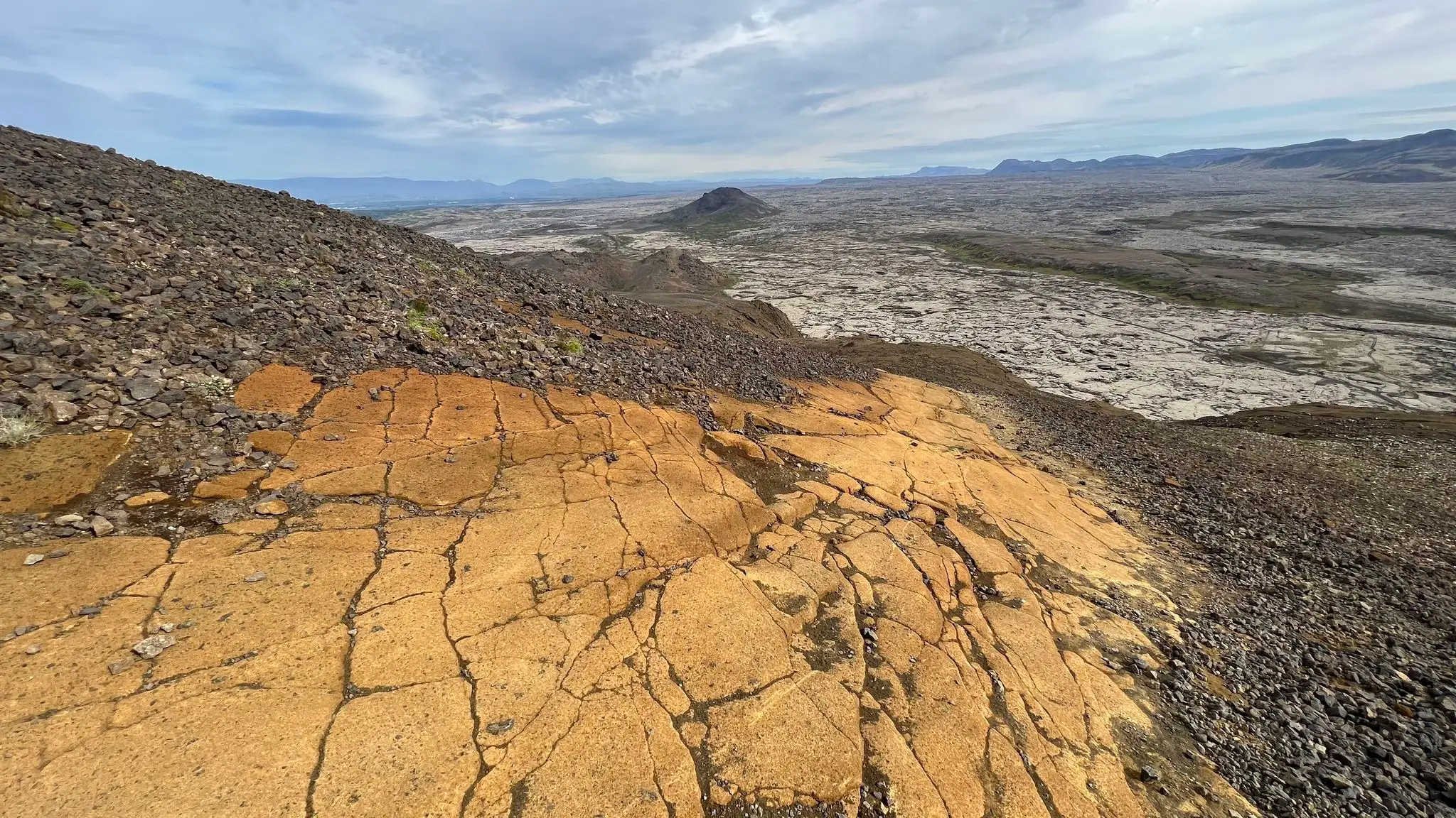 Smooth rock beneath the scree